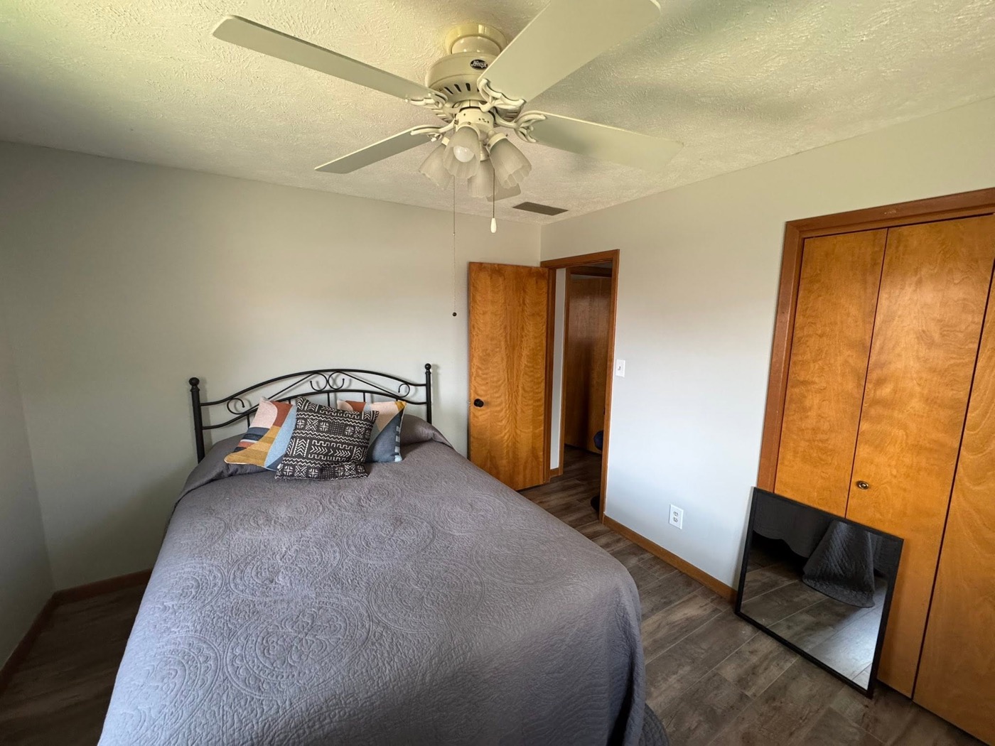 Finished bedroom with gray walls
